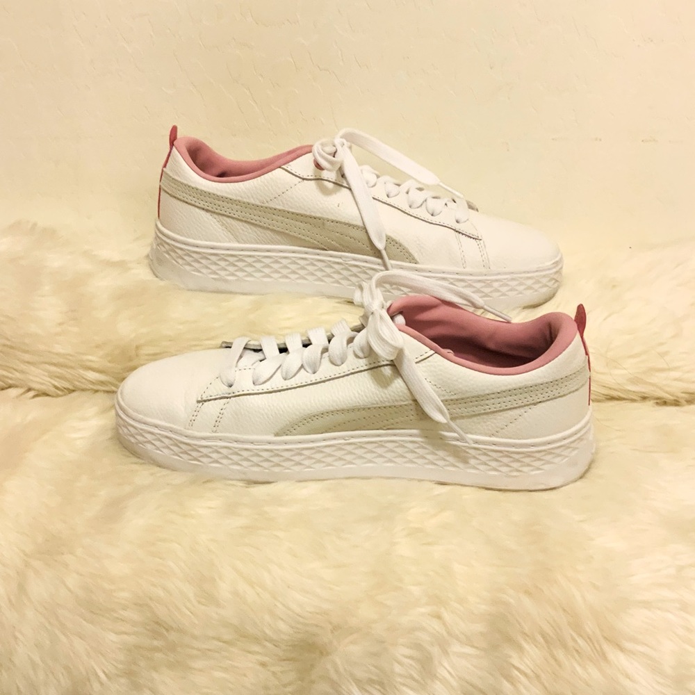 White with pink trim Puma Sneakers